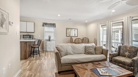 Located in the heart of Seagrove you will discover this one bed/one bath condo with peek views of the gulf located in Beachwood Villas which offers two pools (one heated),lighted tennis courts,shuffle board,community room with laundry room,outdoor co...