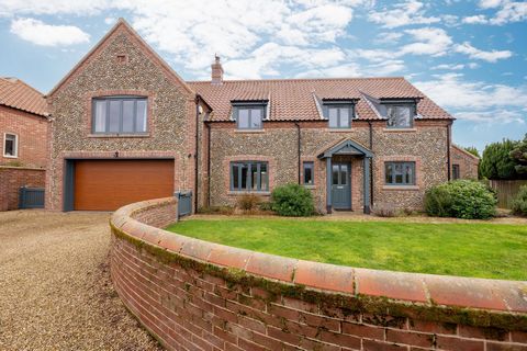 With a setting in the pretty North Norfolk village of Wighton approximately three miles from Wells next-the-Sea and seven miles from Fakenham, this imposing modern brick and flint home with a clay pantile roof was built in 2014. With a breathtaking v...