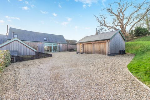 The expert conversion of this stone-built agricultural barn has created a four-bedroom country home that's full of traditional character yet with contemporary styling and lots of luxurious, light-filled spaces. Set amidst the beautiful rolling countr...