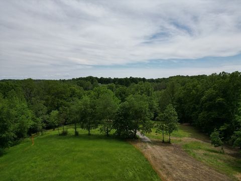 Ready for construction and septic approved! Beautiful private 12.5 acre lot just two miles from historic Leipers Village with a pre-cleared and graded building site for a luxury home. Septic approved by Williamson County for 6+ bedroom. Established d...
