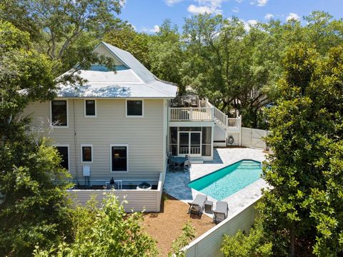 Check out this charming home in the heart of Seagrove Beach. It is located on one of the largest lots in Old Seagrove, boasting mature Live Oak's and an array of beautiful trees, perfectly situated in a prime location. This property embodies the esse...