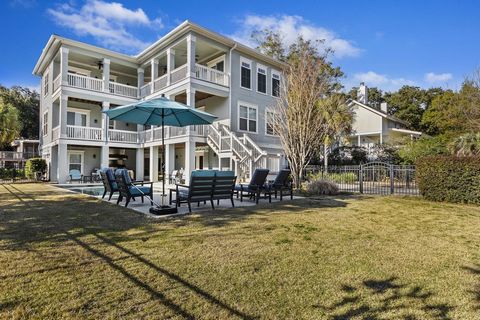 Unveiling a coastal masterpiece! This fully furnished 5 bedroom 5.5 bathroom sanctuary is just steps from the ocean. This property is a dream come true. The main floor features manufactured hardwood floors throughout, a gourmet kitchen with granite i...