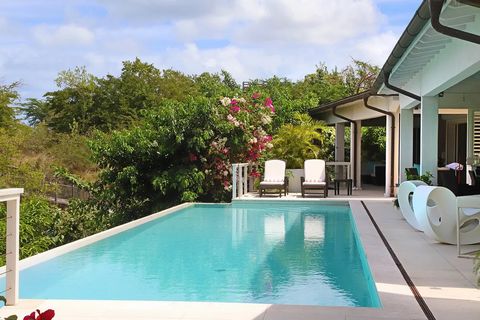 Located in Galley Bay. Located within the gated community of Galley Bay Heights, Villa Champagne is surrounded with lush vegetation and stunning views overlooking the sea. Designed with high ceilings, exposed beams, white walls and a fresh palate, th...