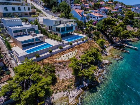 This unusual villa is located in the third row. Just as the other properties of Royal Hill Residence, it also delights with a beautiful, uneclipsed view of the sea and the opposite coast. Total area is 303 sq.m. Land plot is 698 sq.m. Villa offers tw...