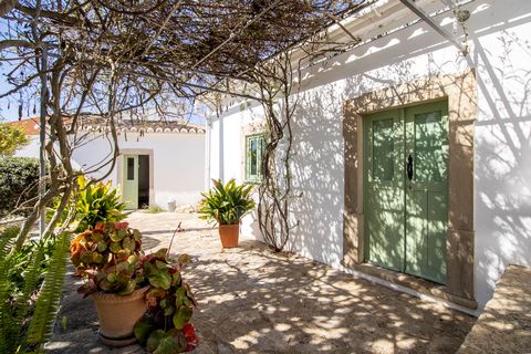 Located in São Brás de Alportel. Traditional 2 bedroom cottage plus an independent bedroom and shower room, set on on a plot of approx. 300 m2 partly gardened and terraced with natural stone from the region, walled-in. The house, with a rustic and tr...