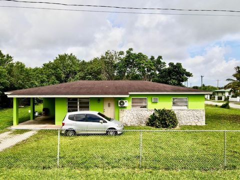 Nestled within the vibrant community of Freeport, Grand Bahama, lies #15 Erickson Drive and Gough Lane---a spacious 3-bedroom, 2-bathroom home awaiting transformation. Boasting approximately 1650 square feet, this property offers an ideal canvas for ...