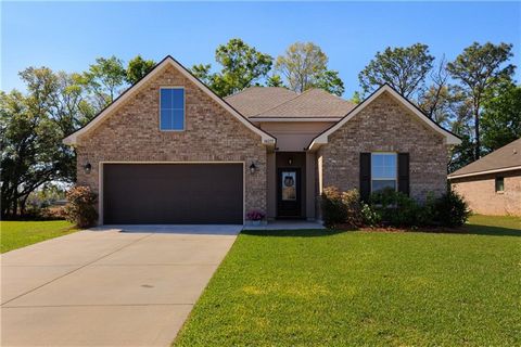 Welcome to your dream home in the charming town of Silver Hill, AL! This pristine 3-bedroom, 2-bathroom gem, built in 2022, exudes modern elegance and comfort throughout.Step into the heart of the home, where a chef's kitchen awaits with sleek white ...