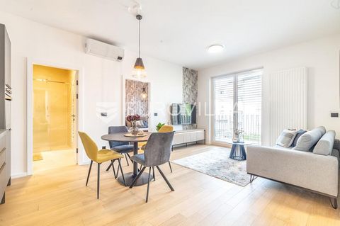 Zagreb, Trnje, luxurious three-room apartment, FIRST RENT. It is located on the first floor of a luxurious new building. It consists of an entrance hall, an open-plan living room with a kitchen and dining room, two bedrooms (one is furnished, the oth...