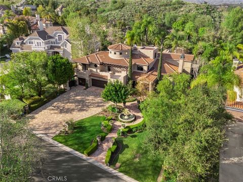 Indulge yourself in the epitome of luxury living with this extraordinary custom home, nestled within the prestigious guard-gated enclave of Coto de Caza. Rebuilt in 2013 and completely remodeled in 2018, this residence is unparalleled. Prepare to be ...