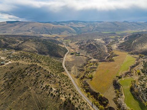 Just South of Lander, Wyoming. The Day Ranch is comprised of 380+/- acres along with a BLM lease for horses/cattle, a 3 bed 2 bath home, shop/barn, loafing sheds, Live Water from Willow Creek and Beason Creek, water rights and so much more!Live water...