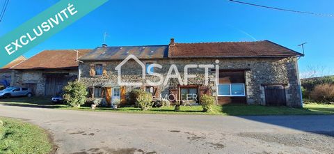 An exclusive opportunity to discover this charming longère-style house in the commune of Montaigut-le-Blanc, Creuse. The spacious living room features an open-plan kitchen with central island, and a living room with wood-burning stove, offering warmt...