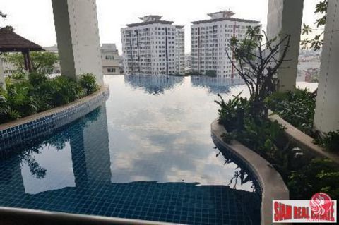 A two bedroom, two bath is for sale in the Sky Walk Condo. The apartment is 73.48 sqm, fully furnished and includes a study room. The unit is elegantly decorated in muted beige tones. It has a large open living plan than includes a living room with s...