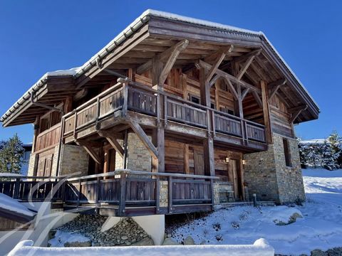 Situated at Mont d'Arbois, in a peaceful setting, this chalet with a total surface area of around 425 m2 will win you over with its mountain spirit. Set in 1233 m2 of land, it offers a warm, authentic interior on 3 levels: 1st floor: a beautiful loun...