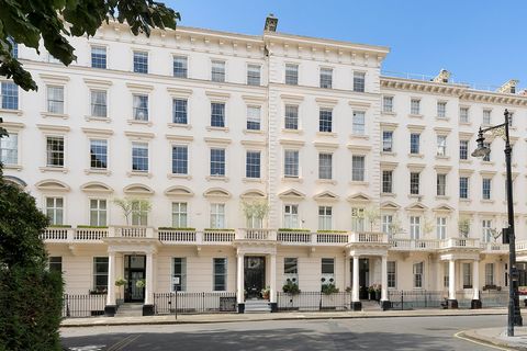 Unfolding over 3,000 square feet, this newly refurbished penthouse has generous living spaces and sweeping views of Eaton Square. The grand reception accommodates a lounge and a dining area, creating a wonderful space for entertaining. The original w...