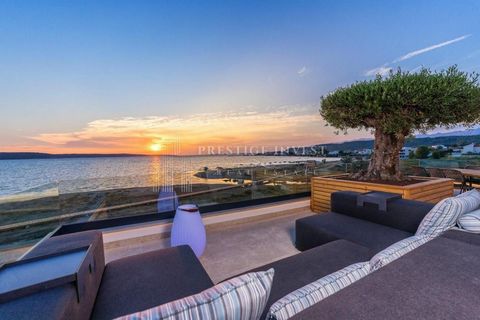 Zadar – Exclusive villa first row to the sandy beach A luxury villa for sale in Zadar, located first row to the beautiful sandy beach. This modern property was built in late 2022 using only the highest quality materials and technologies. Main feature...