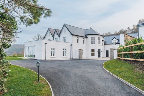 Elevated, Tan Yr Allt Hall invites you to experience unparalleled living with superb town and sea views. Originally constructed in the late 19th century, this substantial four-bedroom hall, with additional annex, has undergone extensive renovation, c...