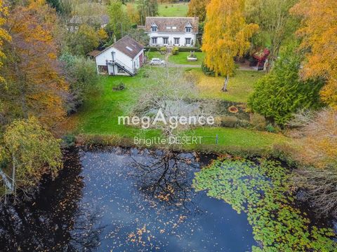 Havre de paix avec cette maison et son magnifique étang poissonneux
