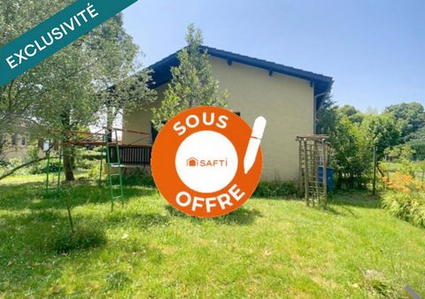 Grande maison de plain pied avec garage et jardin très paisible