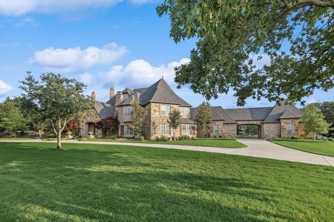 Magnificent resort-style living on 2 acres in the prestigious 24-7 guarded and gated Estates of Tour 18 golf course community. Large corner lot with circle drive and gated porte-cochere to 4 car garage. Designed for entertaining with a large game roo...