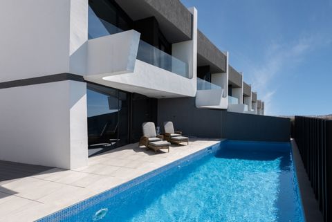 This set of 31 homes is located in an exclusive urbanization in front of a golf course in the province of Malaga just 900 meters from the sea These 125 m2 homes are divided into two levels ground floor and upper floorThe type house has a total area o...
