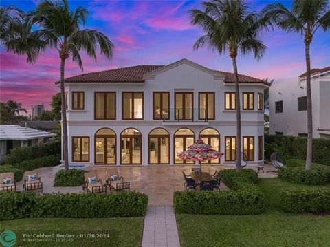 Captivating panoramic vistas greet you upon entering this exceptional estate, gracefully perched on the Port Everglades Ship Channel. The sweeping views, framed by expansive walls of glass, stretch from the ocean, encompassing the Intracoastal Waterw...