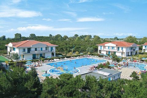 Popular holiday village on a large, well-kept garden plot with pine trees and lots of green spaces in the quiet district of Lido del Sole. The apartments are located in slightly larger residences with three floors or in villas with two floors. Four r...