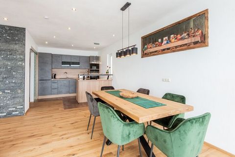 Welcome to this spacious and modern holiday home in Stuhlfelden, Austria, nestled in the picturesque Salzburger Land! This inviting domicile promises a perfect retreat for your holiday, whether in summer or winter. The centrepiece of the house is the...