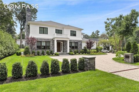 Stone colonial meets flawless modern style in this custom built showplace with new pool on almost half acre in most sought after Fox Meadow This extraordinary BRAND NEW home features incredible sun filled modern spaces with 10 foot ceilings on the fi...
