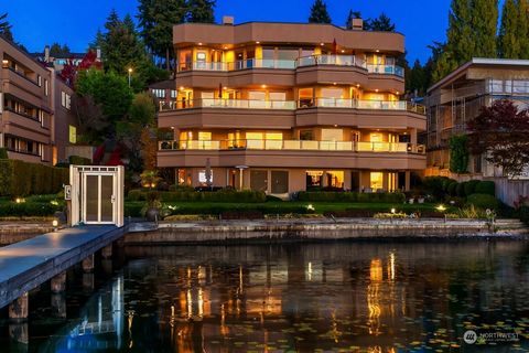Experience majestic sunsets & unobstructed lake and mountain views from this luxurious waterfront home. This pristine, 1-level unit features exquisite updates throughout. Remodeled in 2019, the stunning kitchen opens to both the family room & the gen...
