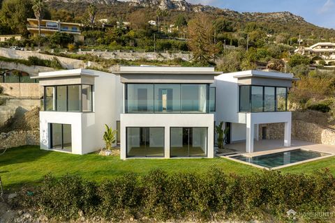 Discover this magnificent new contemporary property located in a sought-after residential area of Vence. Offering panoramic sea views, this 210 m² villa stands on 800 m² of land, with swimming pool. The interior features a total of four spacious bedr...