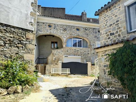 Maison en pierre rénovée de 100m2 habitables et véranda de 20m2