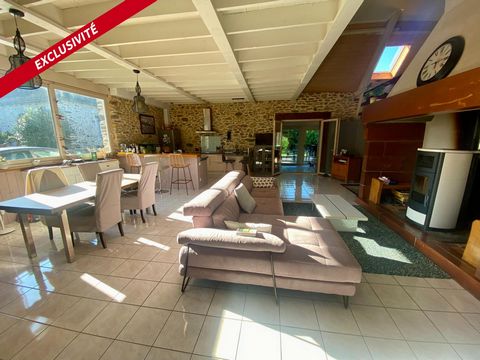 Maison en pierre rénovée avec un esprit loft à Malemort