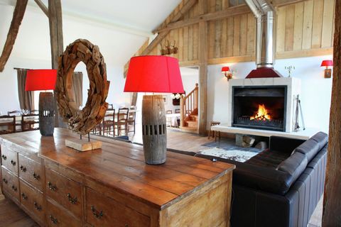 This 9-bedroom holiday home is located in the heart of the Ardennes river in Léglise and can host 22 guests. It is comfortably furnished with a cosy living room with a flatscreen TV, table tennis table and table football for having a fun-filled day i...