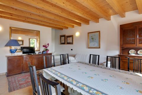 This 1-bedroom mansion in Pesina Spezie with a garden and cozy living-dining room accommodates a family of 5 with children and is ideal for a peaceful vacation surrounded by olive trees, cypresses, and vineyards. Lake Garda is at 6 km. Nature lovers ...