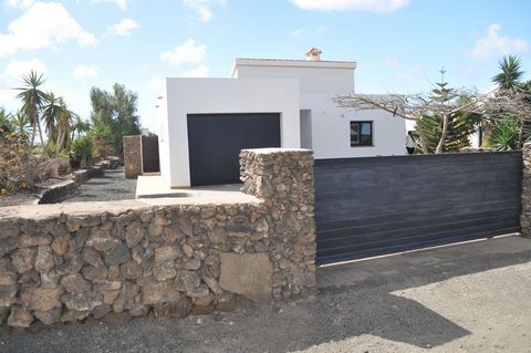 Cosy villa consists of a large and bright living/dining room with an open plan kitchen, fully equipped with floor-to-ceiling windows and with direct access to two large terraces and lovely garden with automatic irrigation. (predisposition for firepla...