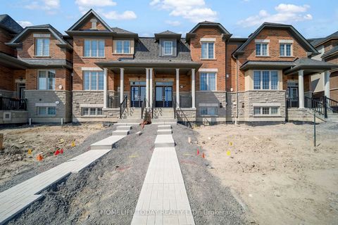 Beautiful brand new freehold townhome, located in West Whitby . Built by reputable builder Tribute! Close to Hwy 412, 401 & 407. Conveniently located close to shopping, transit, schools, community centre . Upgraded finishes throughout, incl hardwood ...