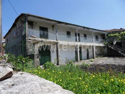 Farm with stone house for restoration, with covered area of 230m2, having 2 floors, quinteiro, eira, and a granar. The land consists of all-flat fields, with a total area of 12,200m2. This property is located in a rural area where agricultural activi...