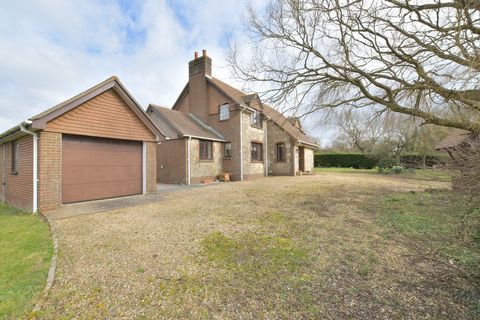 Although not far from the centre of Newport this delightful detached four-bedroom house is set amid approximately one and a half acres of grounds including a large paddock surrounded by countryside and is opposite the renowned Robin Hill Country Park...