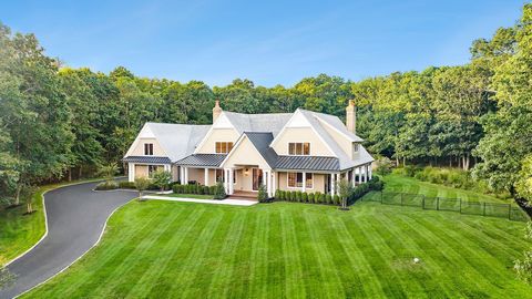 Introducing a recently completed full-scale renovation, this extraordinary 7+ acre gated estate offers a haven of privacy, nestled within a pristine wooded preserve in the highly sought-after Water Mill area. Sunlight bathes every corner of the resid...