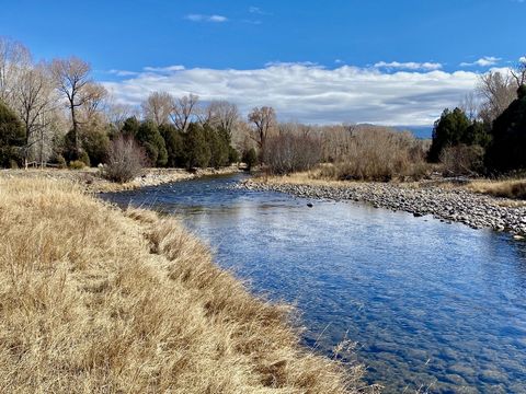 Bull elk and brown trout! Mule deer and rainbows! Tons of hay and fat cattle! Over a mile of river frontage! Belonging to the same family for +/- 150 years, the 710 acres of the Burns Family Farm & Ranch, encompassing over a mile on 