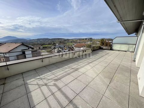 Ref 67808GP, Welcome to the town of Groisy. Come and discover this magnificent Type 5 of 114m² of living space in the penthouse with its 45M² terrace with panoramic views! In a quiet 2012 building with elevator and secure door, enjoy this rare and ex...