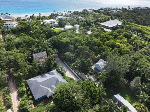 Enjoy a quiet parcel of Harbour Island, by way of Sea Song, where every corner of this lush property echoes with authenticity. Nestled in the serene area of the island, just steps away from the pink sand beach on Quiet Ripley Street, this charming ho...