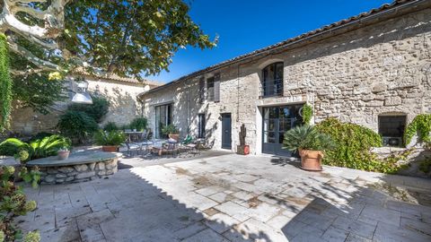 Superb restored 17th century farmhouse with approx. 400 m2 living space, outbuildings and swimming pool, situated 5 minutes from the centre of St Remy de Provence, in the heart of the countryside. Accommodation comprises a vast kitchen opening onto t...