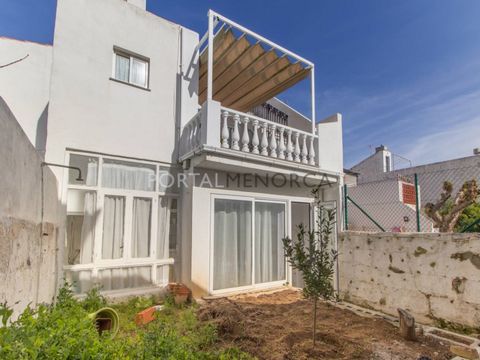 If you are looking for your new home in Sant Lluís, don't miss this house with patio for sale, which also has a garage. It is a house of about 200 m² divided into two dwellings. On the ground floor, which needs to be renovated, you will find the gara...