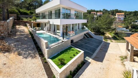 Ultramodern villa with indoor and outdoor swimming pools on glamourous Hvar island in Vrboska area just 50 meters from the sea! Fantastic sea views are opening from the wide panoramic windows! Wonderful pebble beach is nearby. Official category is 4*...