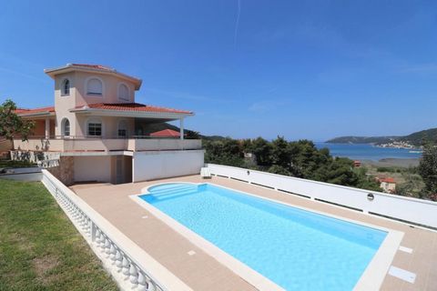 Fantastic luxury villa with sea views on Rab island in Supetarska Draga! Perfect location on top of the hill, surrounded by greenery and overlooking the sea. The villa was built in 2008. It consists of ground and first floor. The ground floor level t...