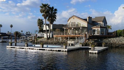 $100,000 PRICE REDUCTION from original list - Exquisite Discovery Bay Waterfront Oasis with waterfront POOL. Prepare to be captivated by the sheer beauty of this absolutely stunning waterfront home. Situated on a cherished point lot with mesmerizing ...