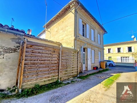 ARVEYRES ALBALYS Immobilier Libourne invites you to visit this stone house of 100 m2 offering a living room with open kitchen, an office, a laundry room, two bedrooms, one with dressing room and a bathroom. All complemented by a wooden terrace. Ideal...