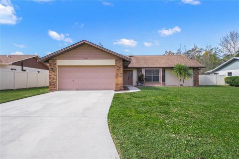 Introducing 8469 Cypress Lake Circle, available for the first time since 1988! This beautifully maintained home offers immediate move-in potential, or the perfect opportunity to personalize with cosmetic upgrades. Boasting a cozy wood-burning firepla...