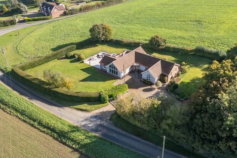 Open fields stretching before you in every direction, with wrap around gardens teeming with wildlife – you couldn’t ask for a better location than this. With a wonderful rural feel, it’s hard to believe but this property is just a few minutes from th...